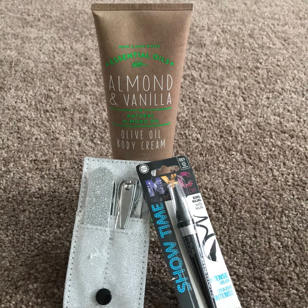 Manicure kit, mascara, and almond scented lotion